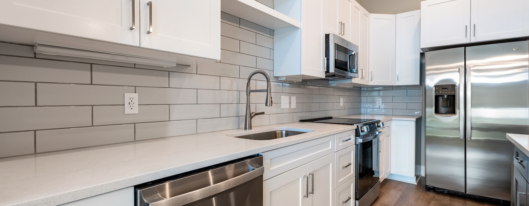 kitchen with white cabinets and stainless steel appliances