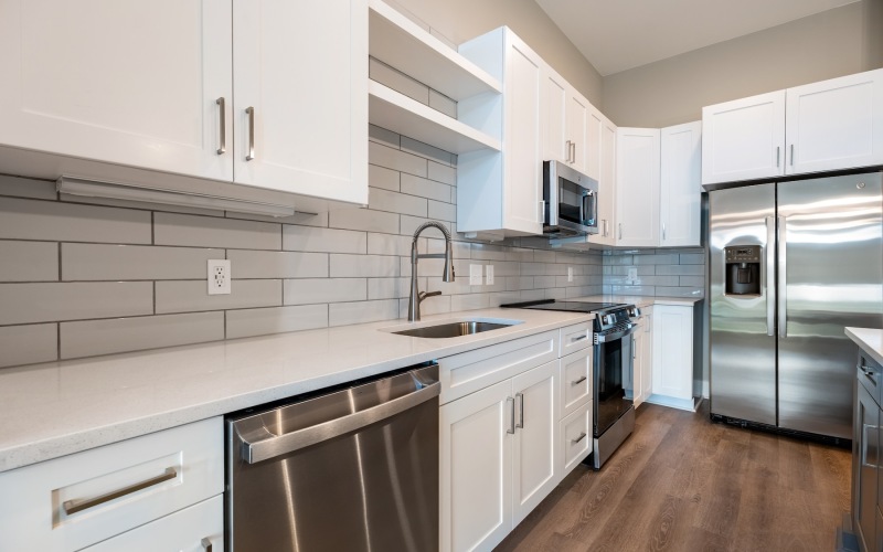 kitchen with white cabinets and stainless steel appliances