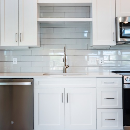 kitchen with white cabinets and stainless steel appliances