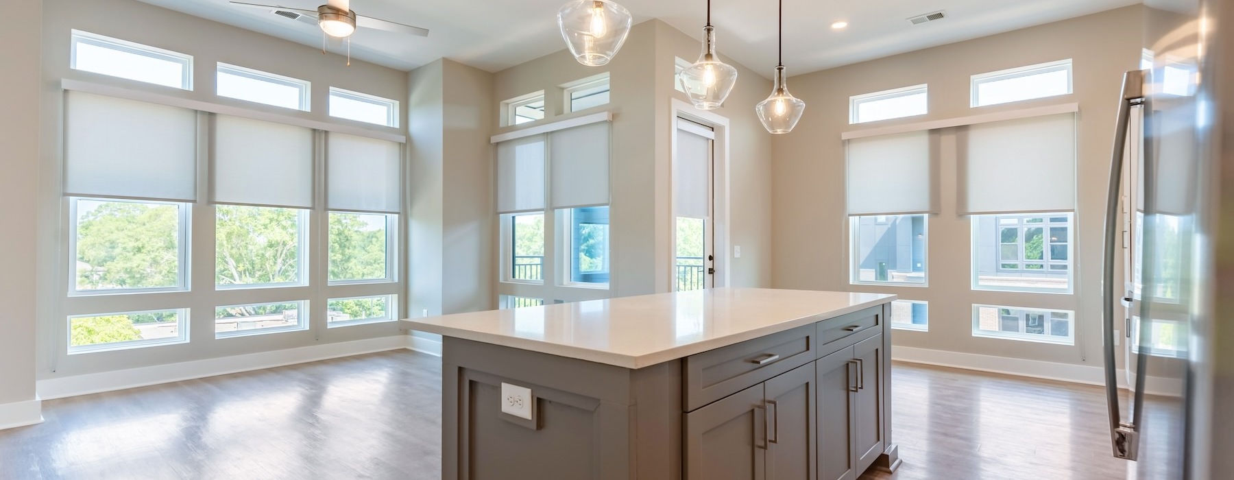 kitchen with island and wood flooring