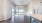 living room with wood flooring and windows
