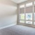 bedroom with carpet and windows