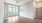 living room with wood flooring and windows