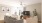 a living room with a tv and couches