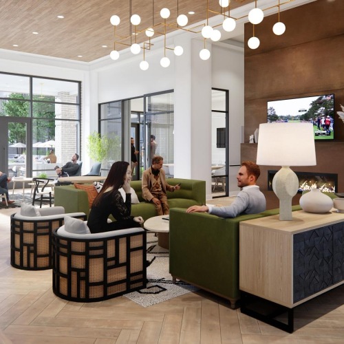 a group of people sitting in a living room