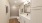 a bathroom with a sink toilet and mirror